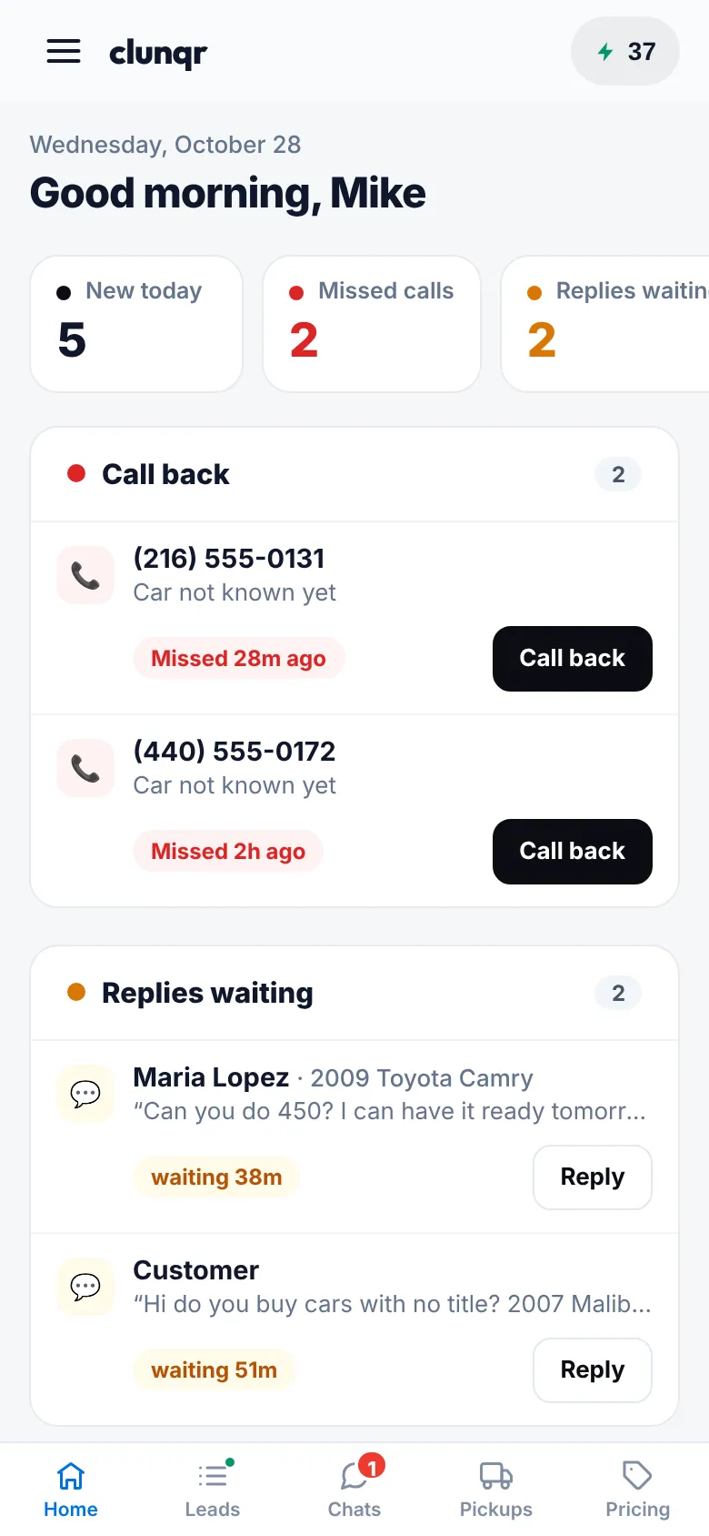 Home on a phone with new leads, missed calls and replies waiting.